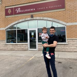 Marino and his son outside of Bellissima cakes and pastries, a local family ran shop